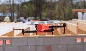 Drone surveying a construction site to capture accurate land and project data