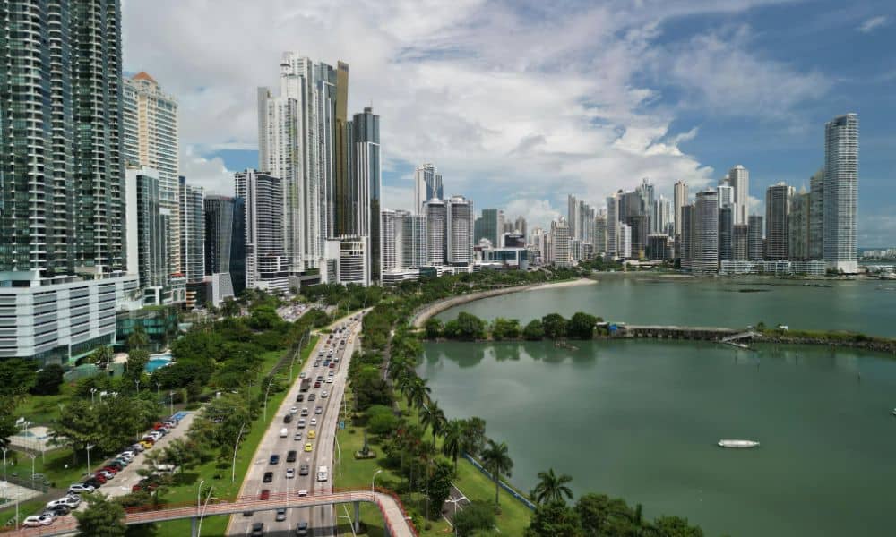 Land Surveyor Insights for Coastal Flood Risk in Panama City FL - ALTA SURVEY Florida Aerial view of high-rise buildings along the Panama City, FL waterfront—an area where land surveyor assesses elevation and FEMA flood zone compliance for coastal development.