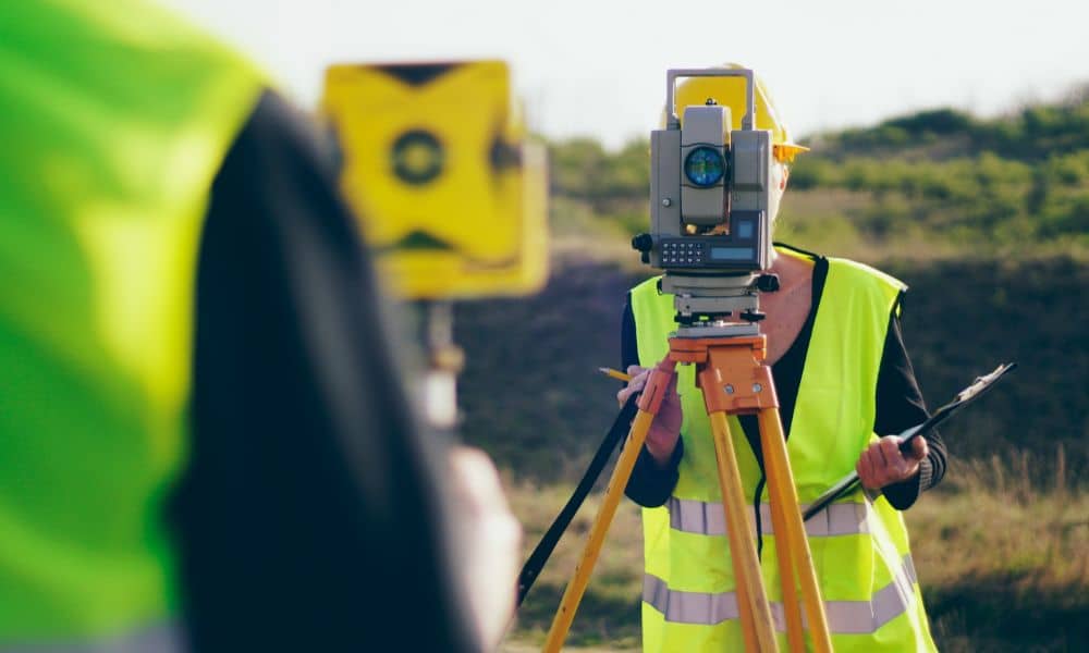 alta survey commercial property florida - ALTA SURVEY Florida Surveyor using total station equipment during a commercial ALTA survey