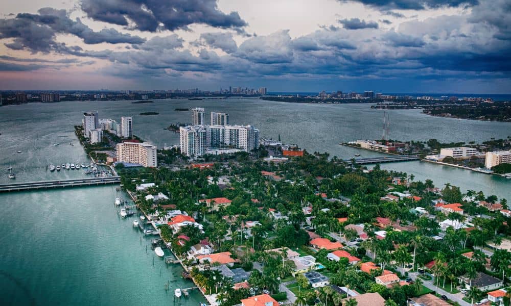 aerial view of miami waterfront due diligence survey - ALTA SURVEY Florida Aerial view of Miami waterfront neighborhoods and high-rises, showing areas where a due diligence survey is essential before buying land