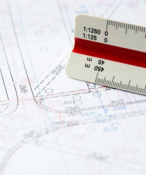 Due diligence survey map blueprint - ALTA SURVEY Florida Close-up of a land survey blueprint with a scale ruler showing property boundaries and easement lines in a due diligence survey