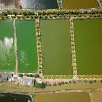 Aerial engineered water retention ponds - ALTA SURVEY Florida Aerial view of engineered water retention ponds showing how detention pond design manages stormwater storage and controlled water release