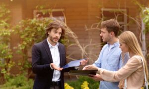 Homeowners reviewing property documents after discovering a boundary survey was needed to clarify ownership