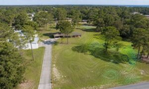 Aerial view of a Panama City, Florida property with LiDAR mapping revealing subtle ground surface changes